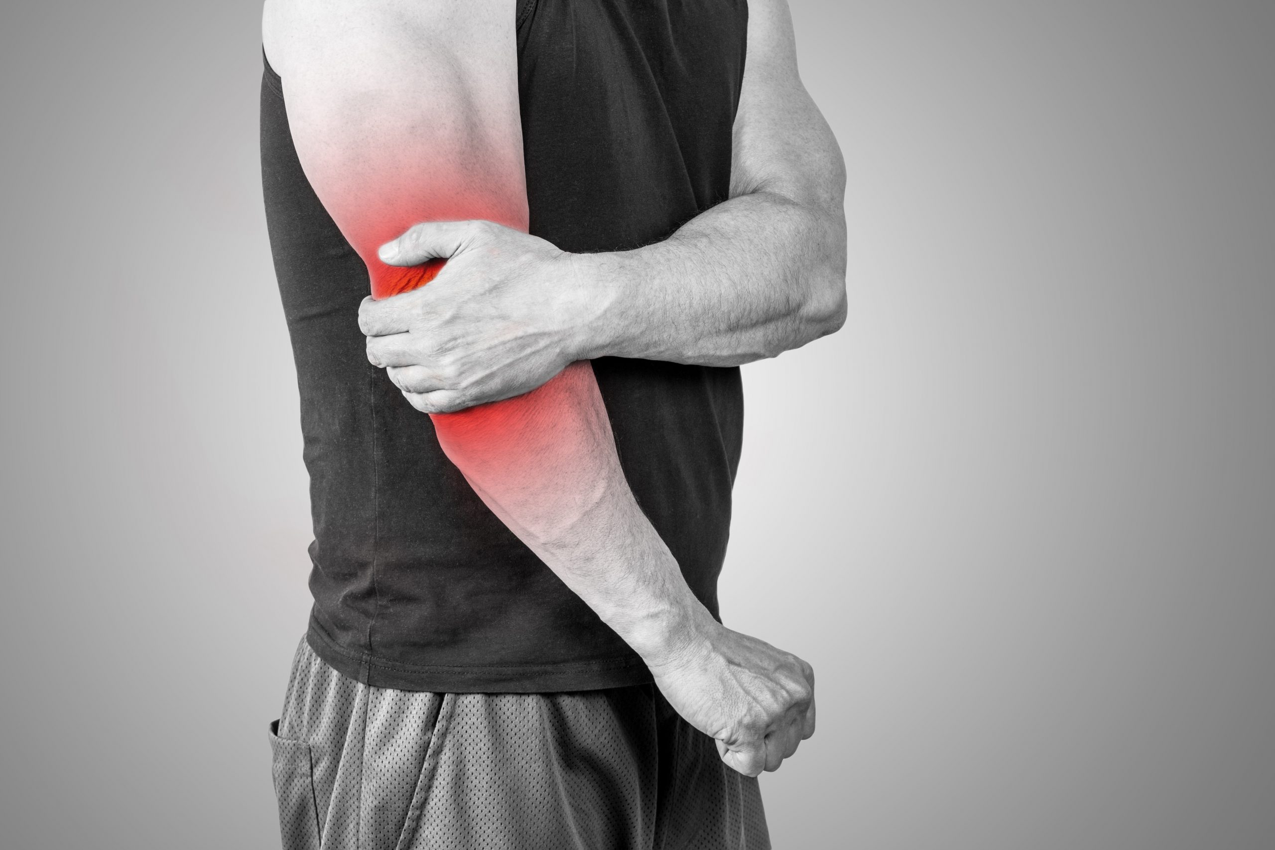 Muscle,Man,Holds,His,Injured,Elbow.,Red,Color,Is,Pain
